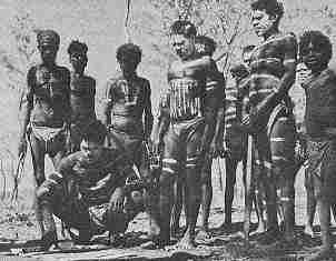 Aborigine men taking part in a sacred religious ritual.